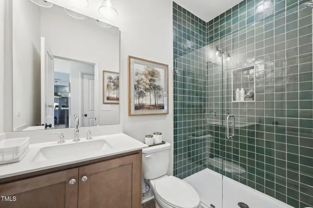 a bathroom with a sink a mirror and a bathtub