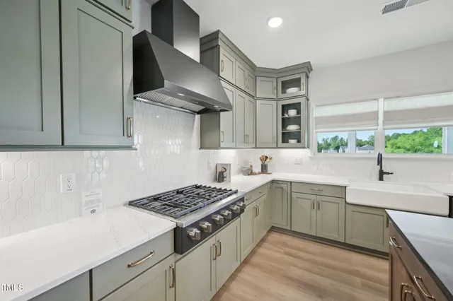a living room with furniture fireplace and a table