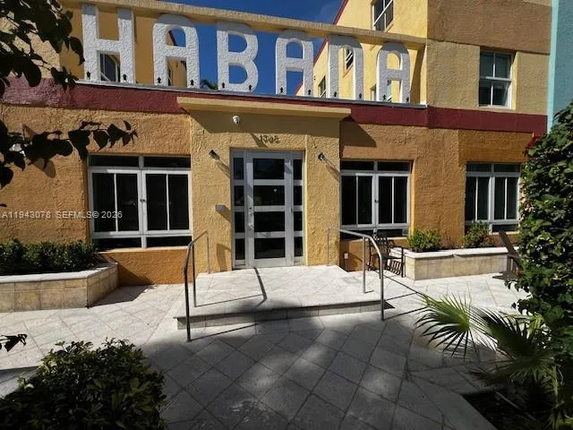 a front view of a house with a patio