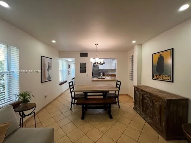 a view of a workspace with furniture