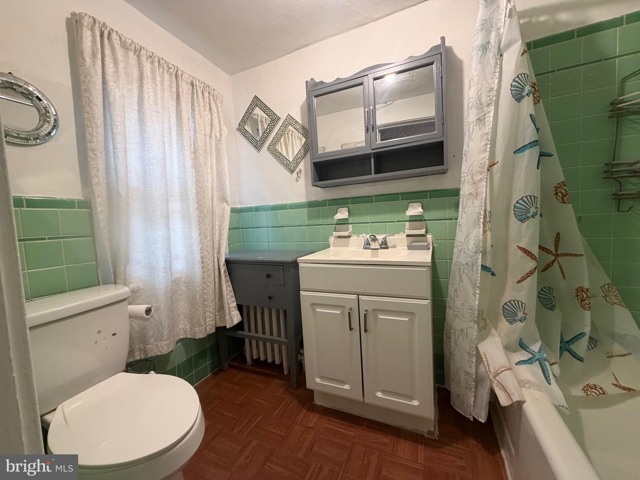 318 South 11th Street Reading, PA 19602 - Photo 12 of 21 a bathroom with a sink toilet and shower