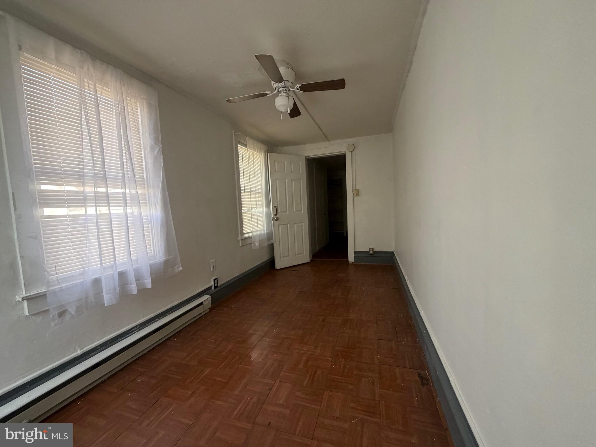 318 South 11th Street Reading, PA 19602 - Photo 20 of 21 a view of an empty room with a window