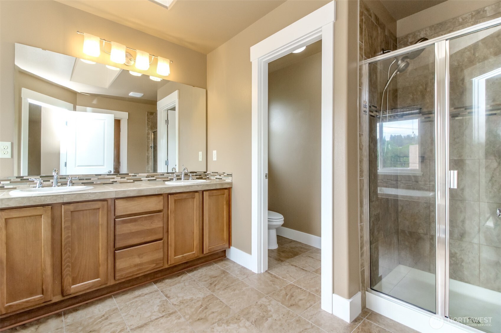 3000 South Mt Baker Boulevard Seattle, WA 98144 - Photo 24 of 40 a bathroom with a granite countertop sink mirror and toilet