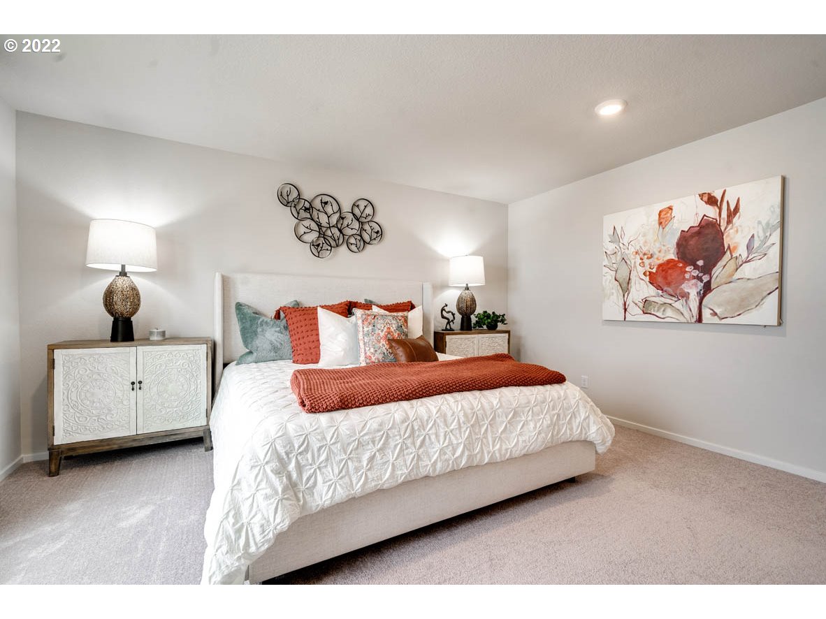 2867 Fenya Street Springfield, OR 97477 - Photo 11 of 18 a bedroom with a bed and a painting on the wall