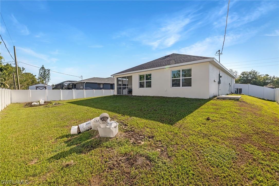 17504 Oriole Road Fort Myers, FL 33967 - Photo 21 of 23 a view of a house with a big yard