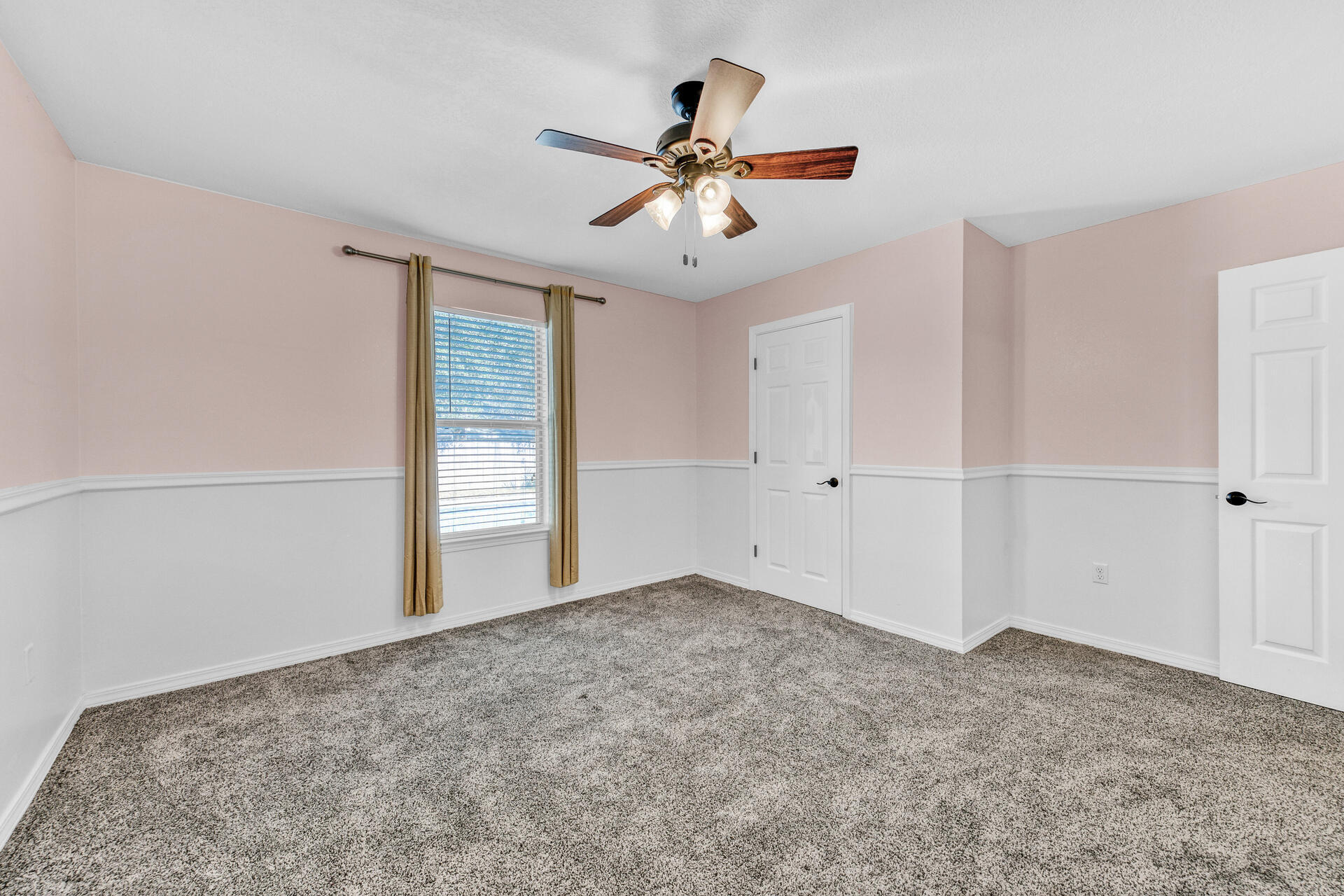606 Risen Star Drive Crestview, FL 32539 - Photo 24 of 37 an empty room with closet and windows