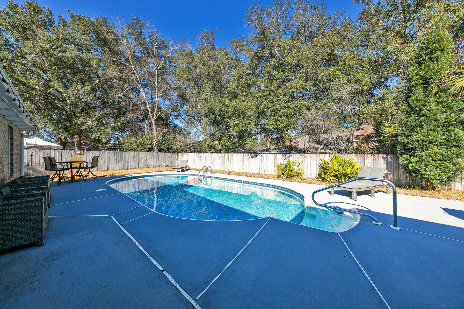 606 Risen Star Drive Crestview, FL 32539 - Photo 28 of 37 a view of a swimming pool with a patio