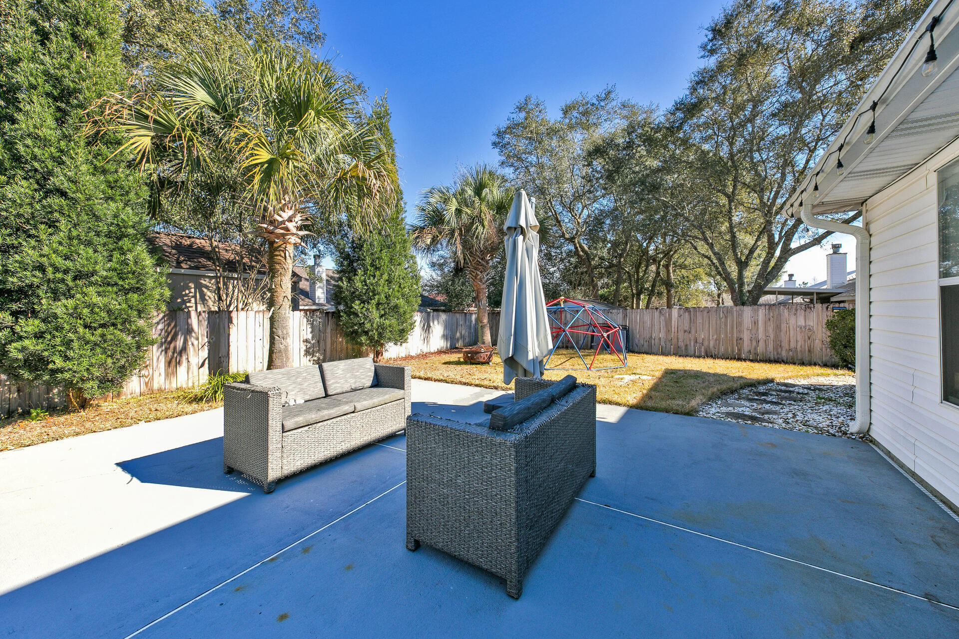 606 Risen Star Drive Crestview, FL 32539 - Photo 29 of 37 a view of outdoor space yard swimming pool and furniture