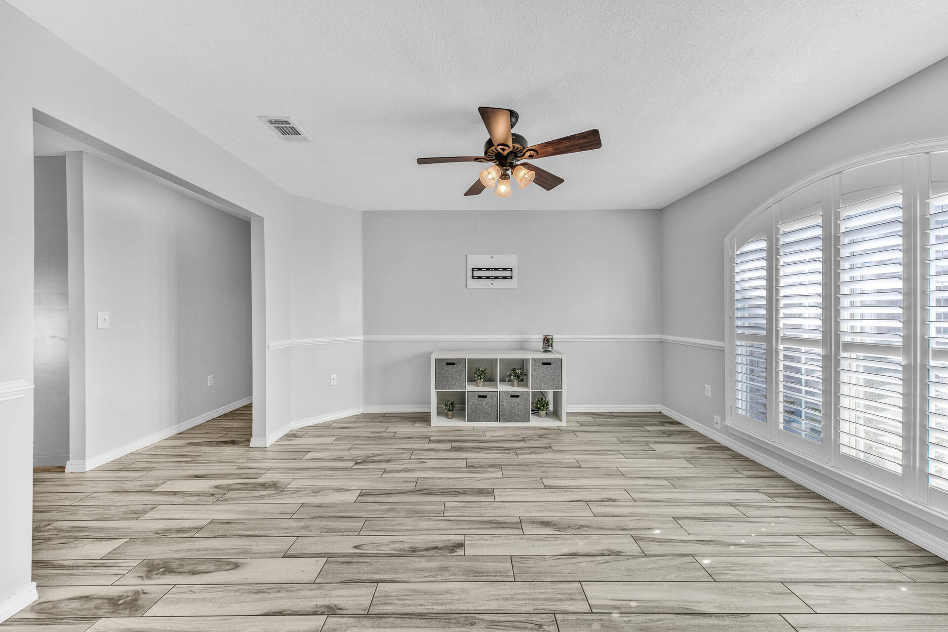 606 Risen Star Drive Crestview, FL 32539 - Photo 6 of 37 a view of an empty room with a window
