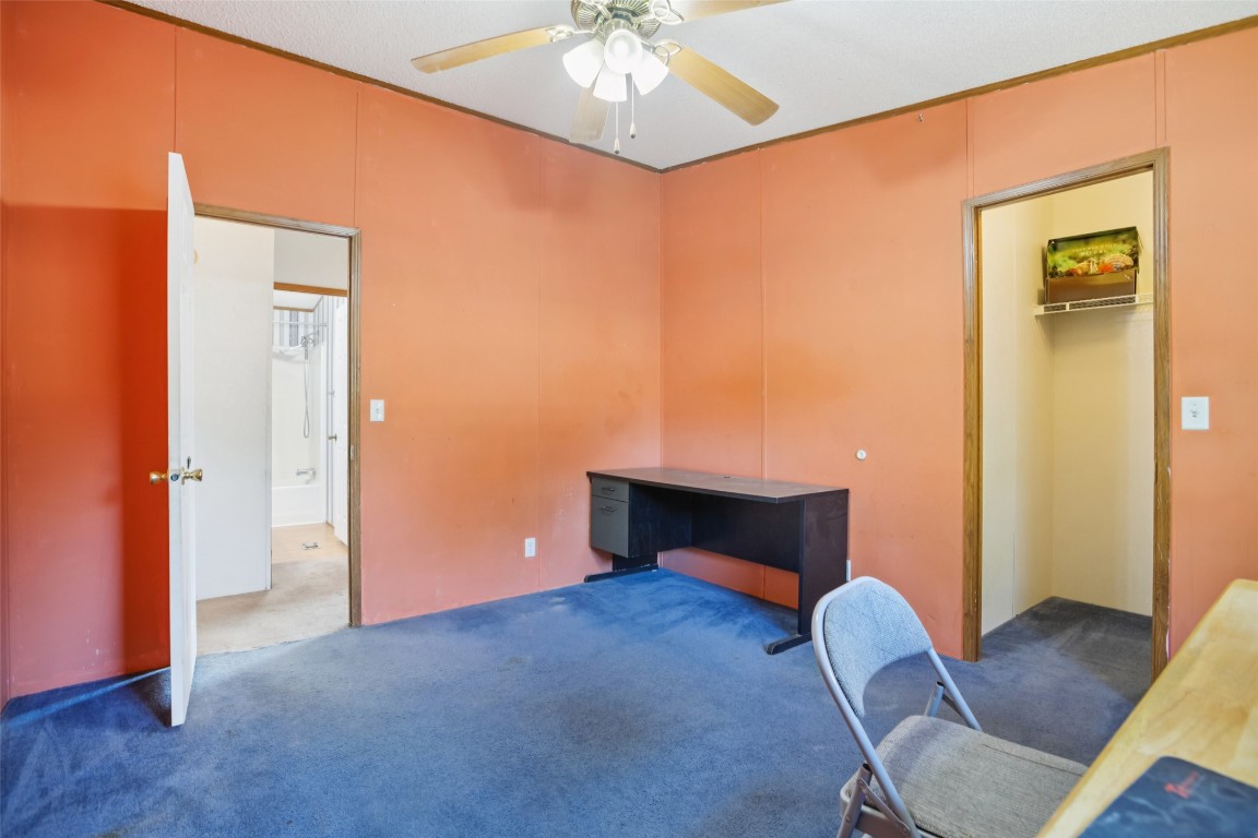 6975 Silvermine Road Harwood, TX 78632 - Photo 13 of 33 a room with furniture and a fireplace