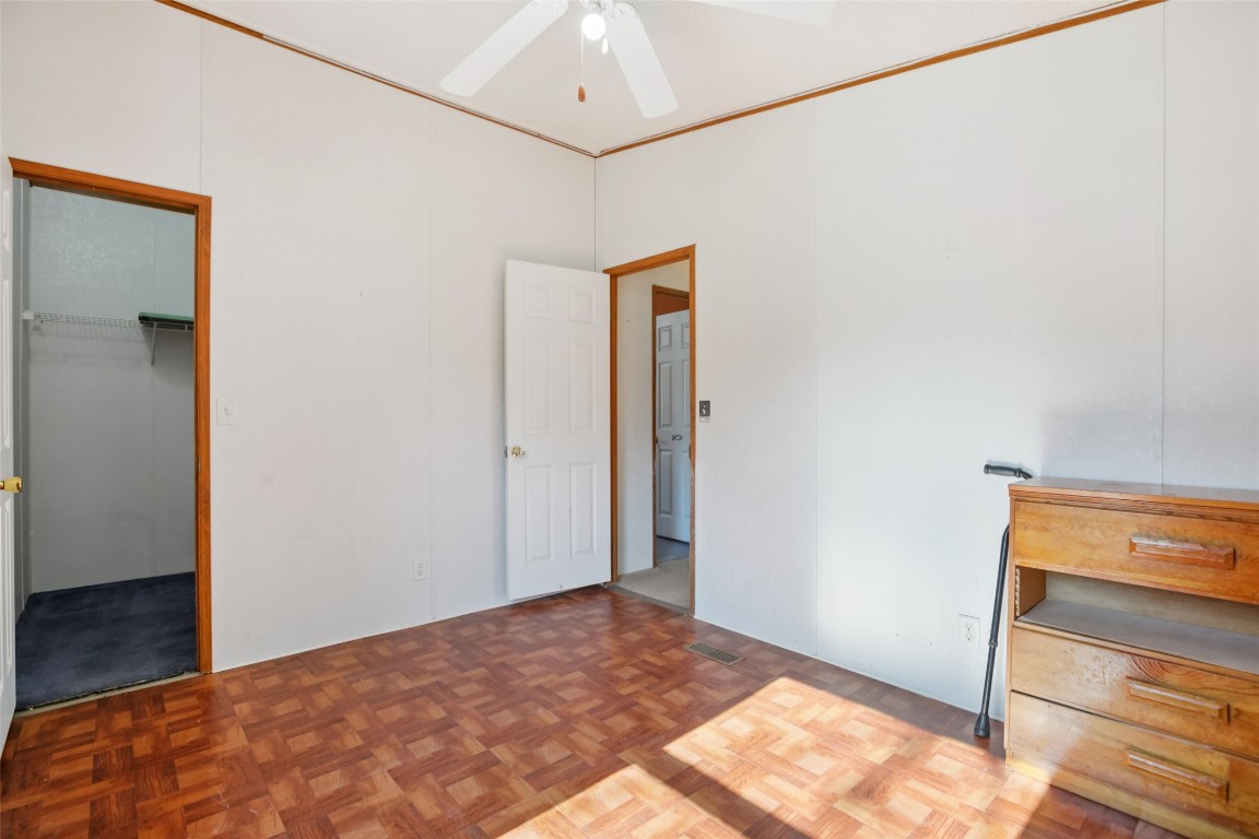 6975 Silvermine Road Harwood, TX 78632 - Photo 16 of 33 a view of a room with wooden floor