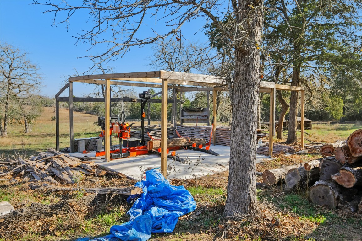 6975 Silvermine Road Harwood, TX 78632 - Photo 26 of 33 a view of a swimming pool with a patio