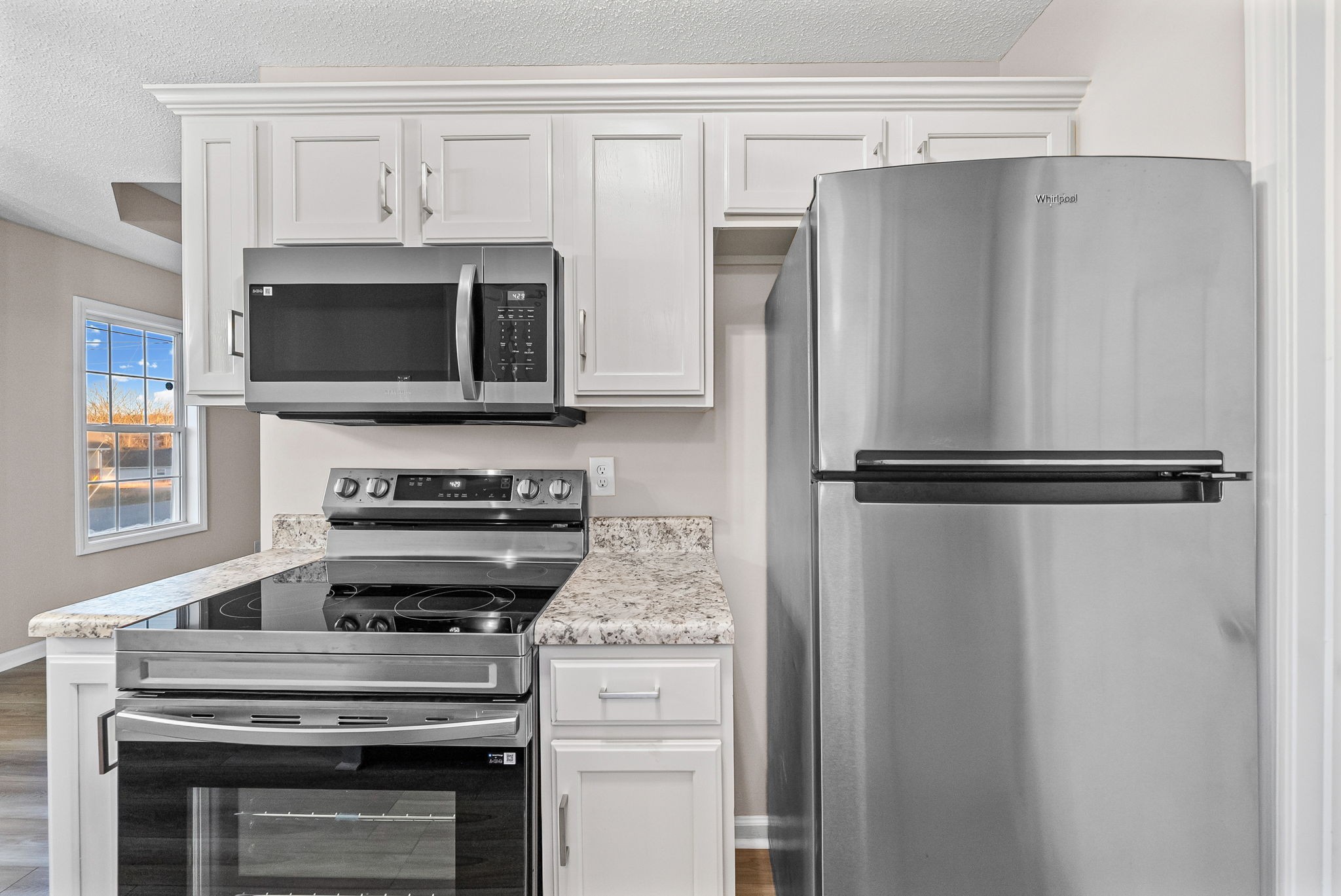 1010 Winesap Road Clarksville, TN 37040 - Photo 11 of 22 a kitchen with cabinets and stainless steel appliances