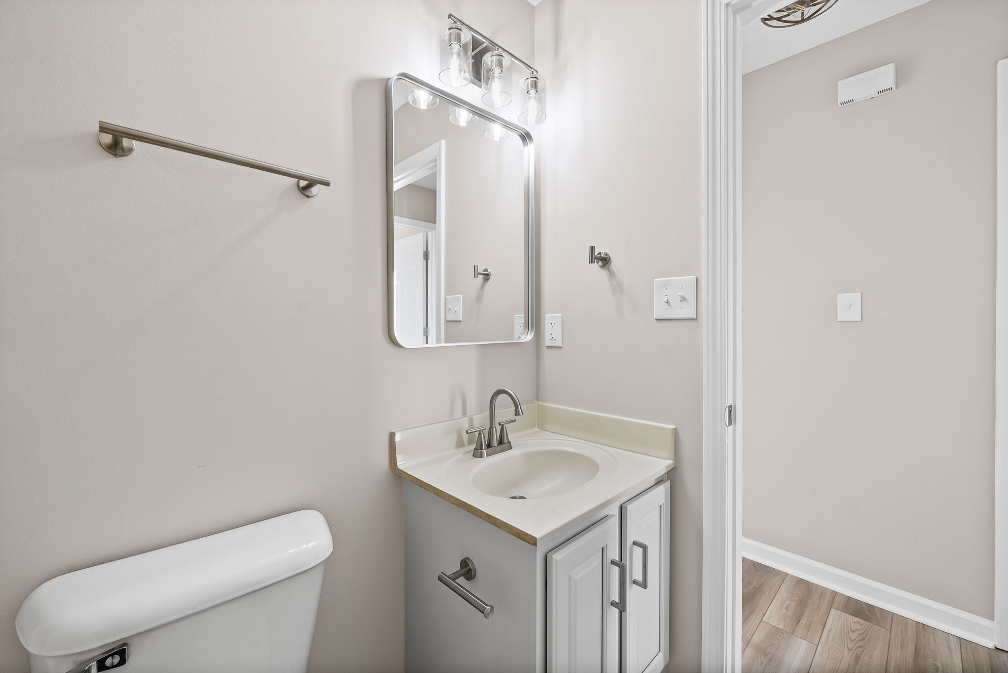 1010 Winesap Road Clarksville, TN 37040 - Photo 16 of 22 a bathroom with a toilet sink and mirror