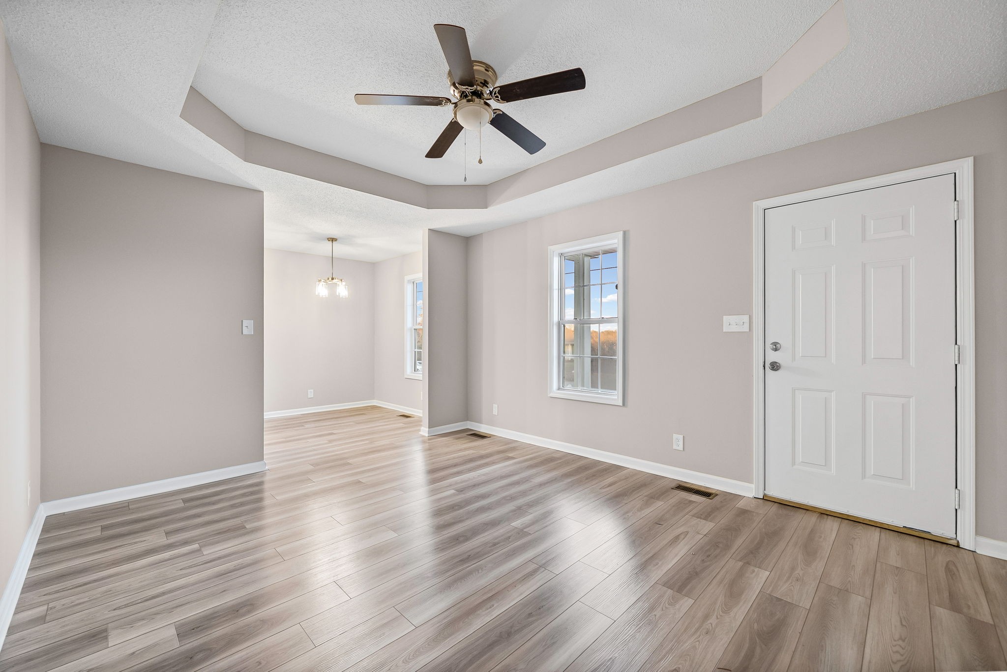 1010 Winesap Road Clarksville, TN 37040 - Photo 4 of 22 a view of empty room with wooden floor and ceiling fan