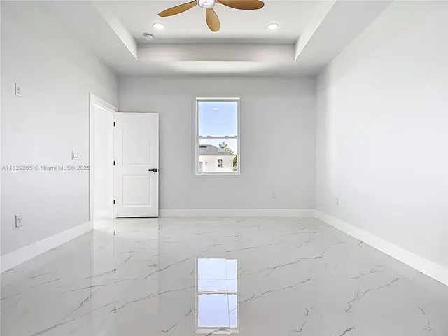 a bathroom with 2 sink and a bathtub