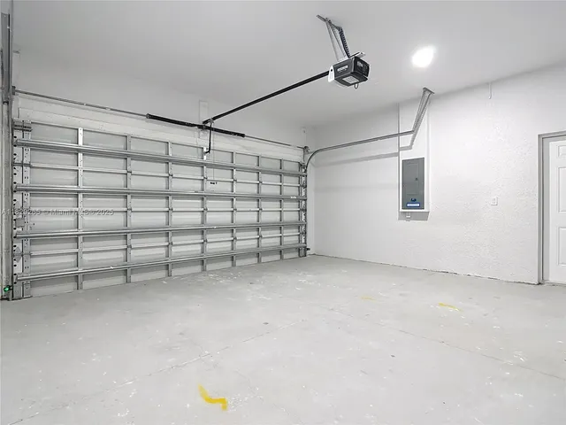 a view of a city street and ocean view