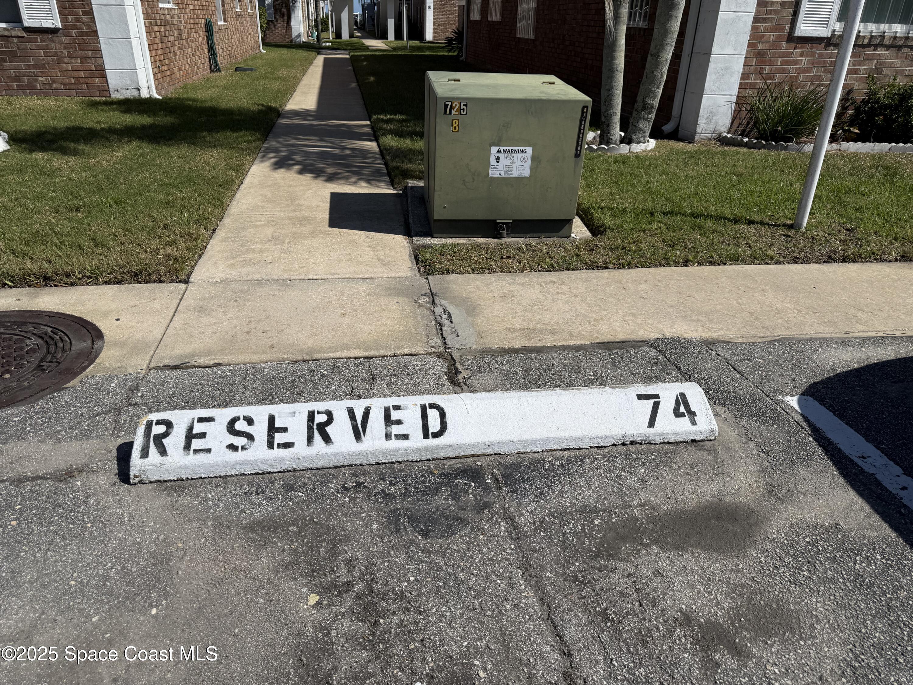 190 East Olmstead Drive, Unit E5 Titusville, FL 32780 - Photo 5 of 26 a view of a sign board