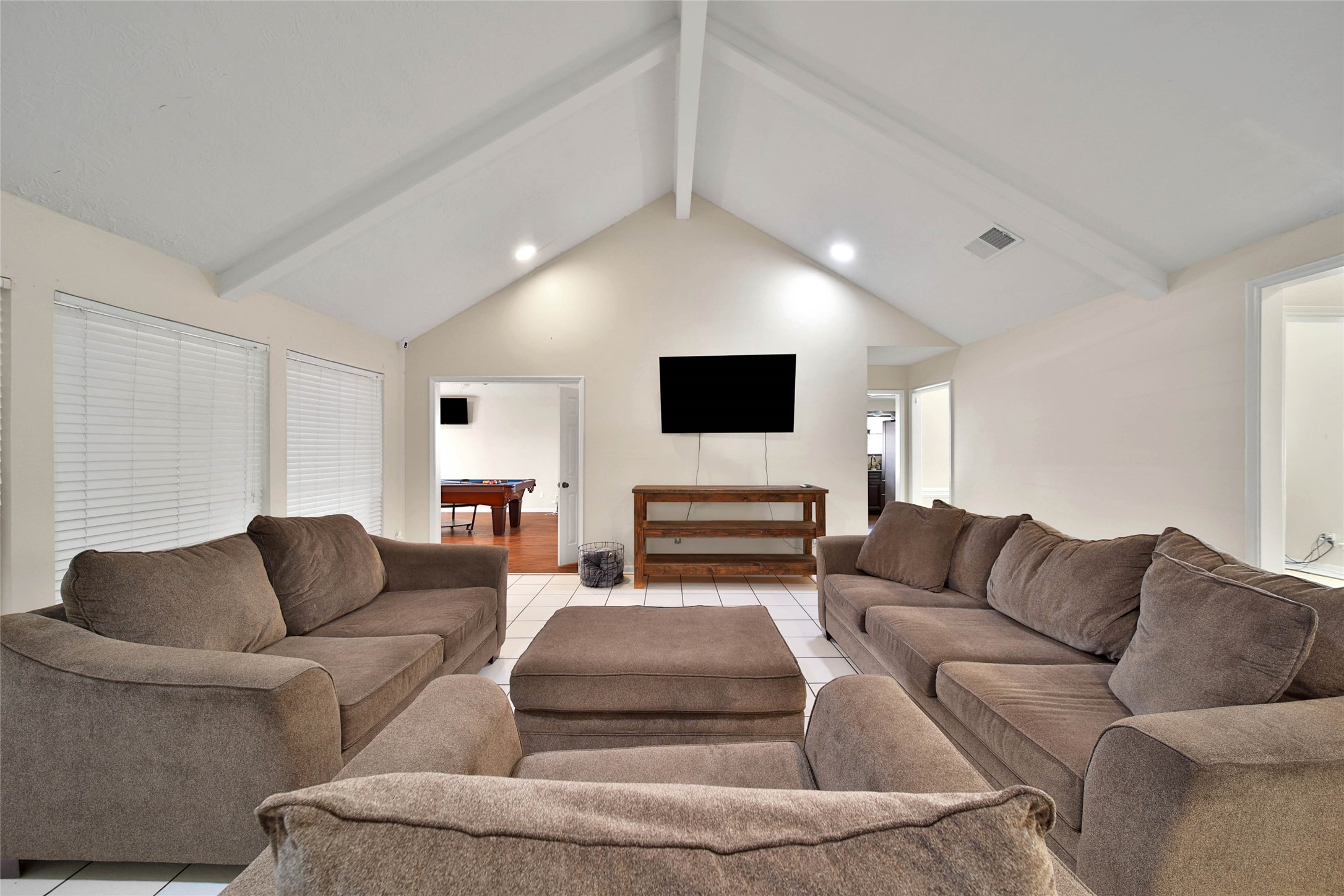 15319 Rio Plaza Drive Houston, TX 77083 - Photo 7 of 26 High ceiling living room area.