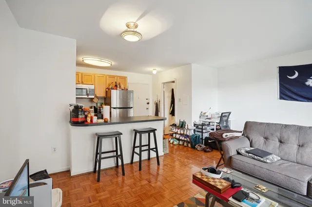 a kitchen with refrigerator and window