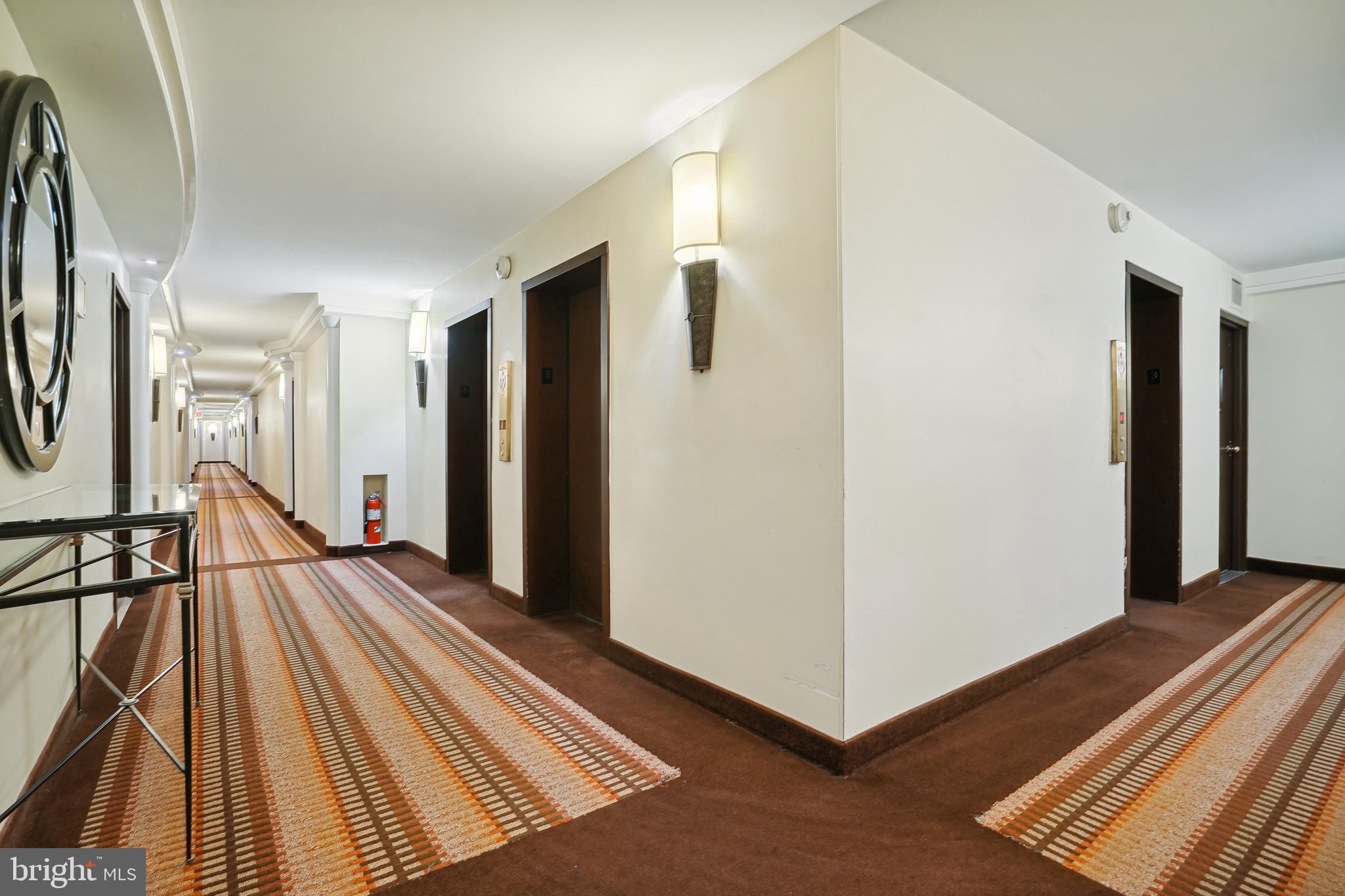 950 25th Street Northwest, Unit 814N Washington, DC 20037 - Photo 40 of 44 a view of a room with wooden floor