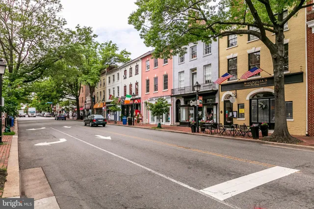 a view of a street with cars