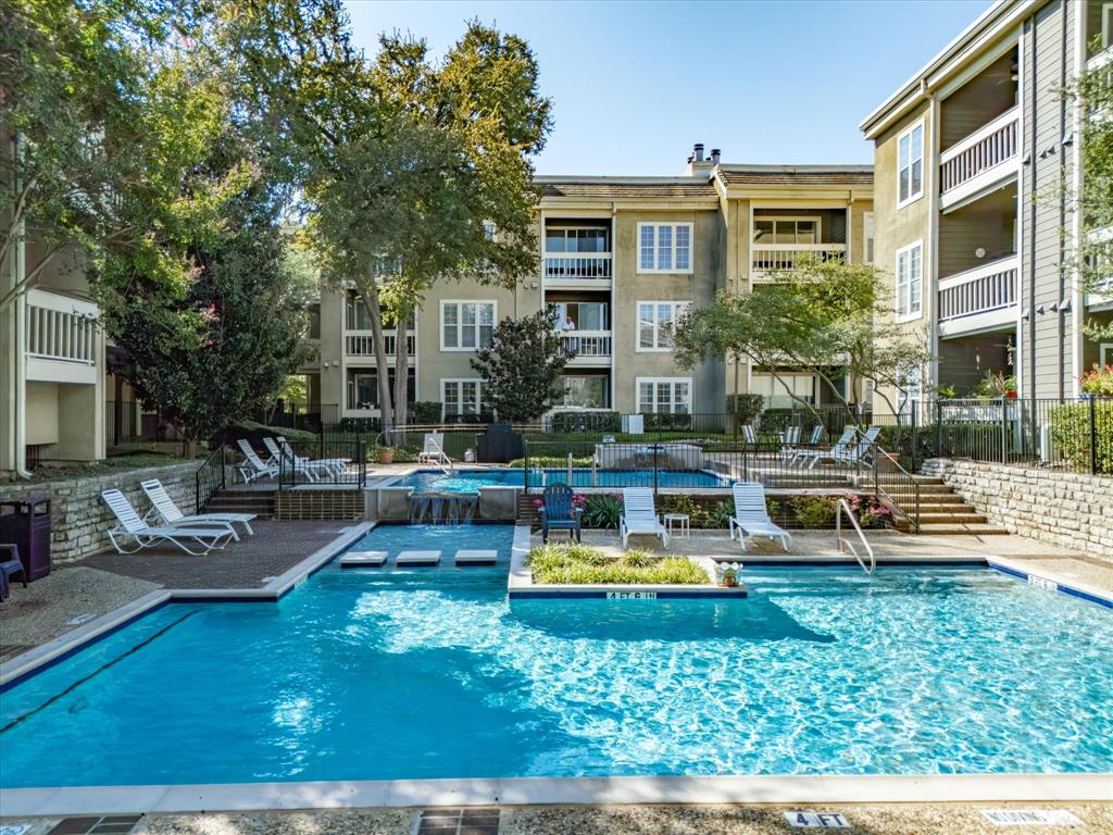 5310 Keller Springs Road, Unit 332 Dallas, TX 75248 - Photo 34 of 39 Community pool with a patio