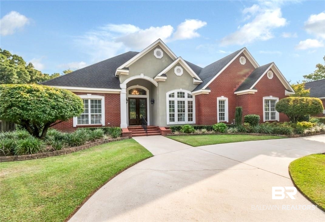 8837 Dawes Lake Road South Mobile, AL 36619 - Photo 1 of 44 View of front of home with a front lawn and french doors