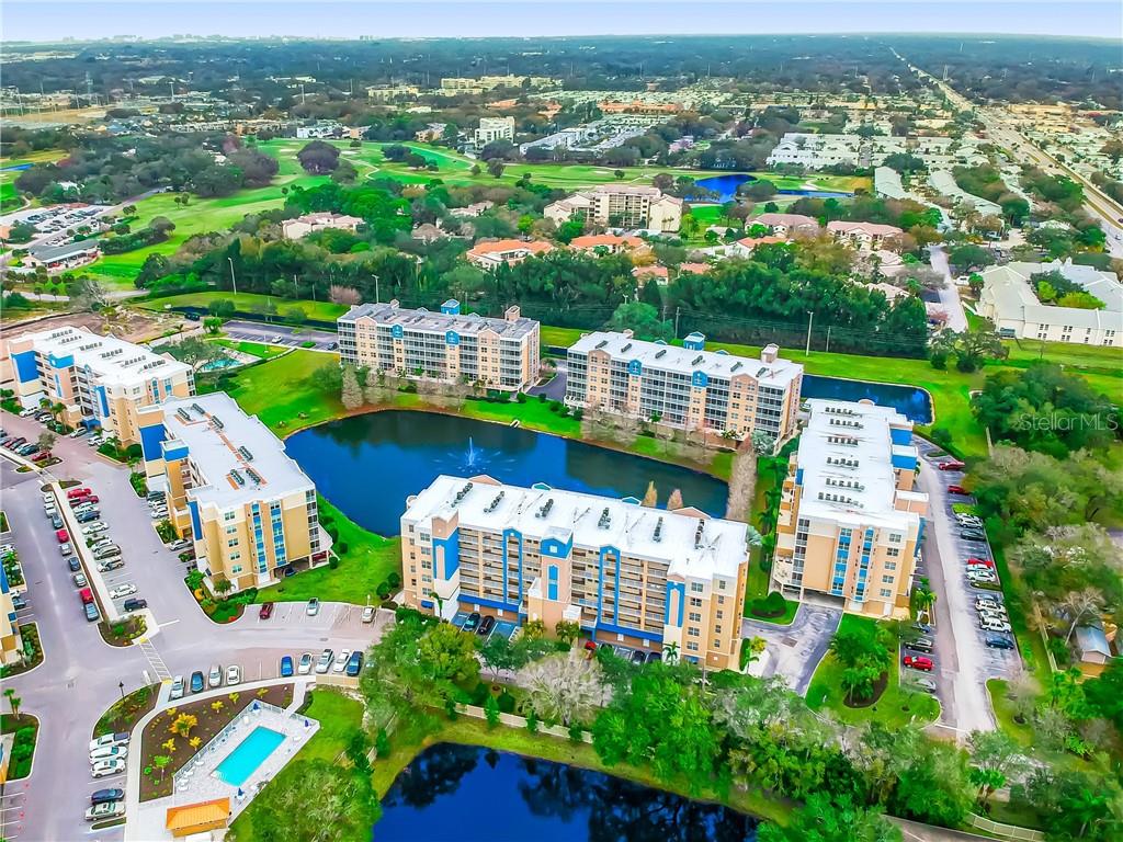 960 Starkey Road, Unit 2102 Largo, FL 33771 - Photo 1 of 1 an aerial view of multiple house