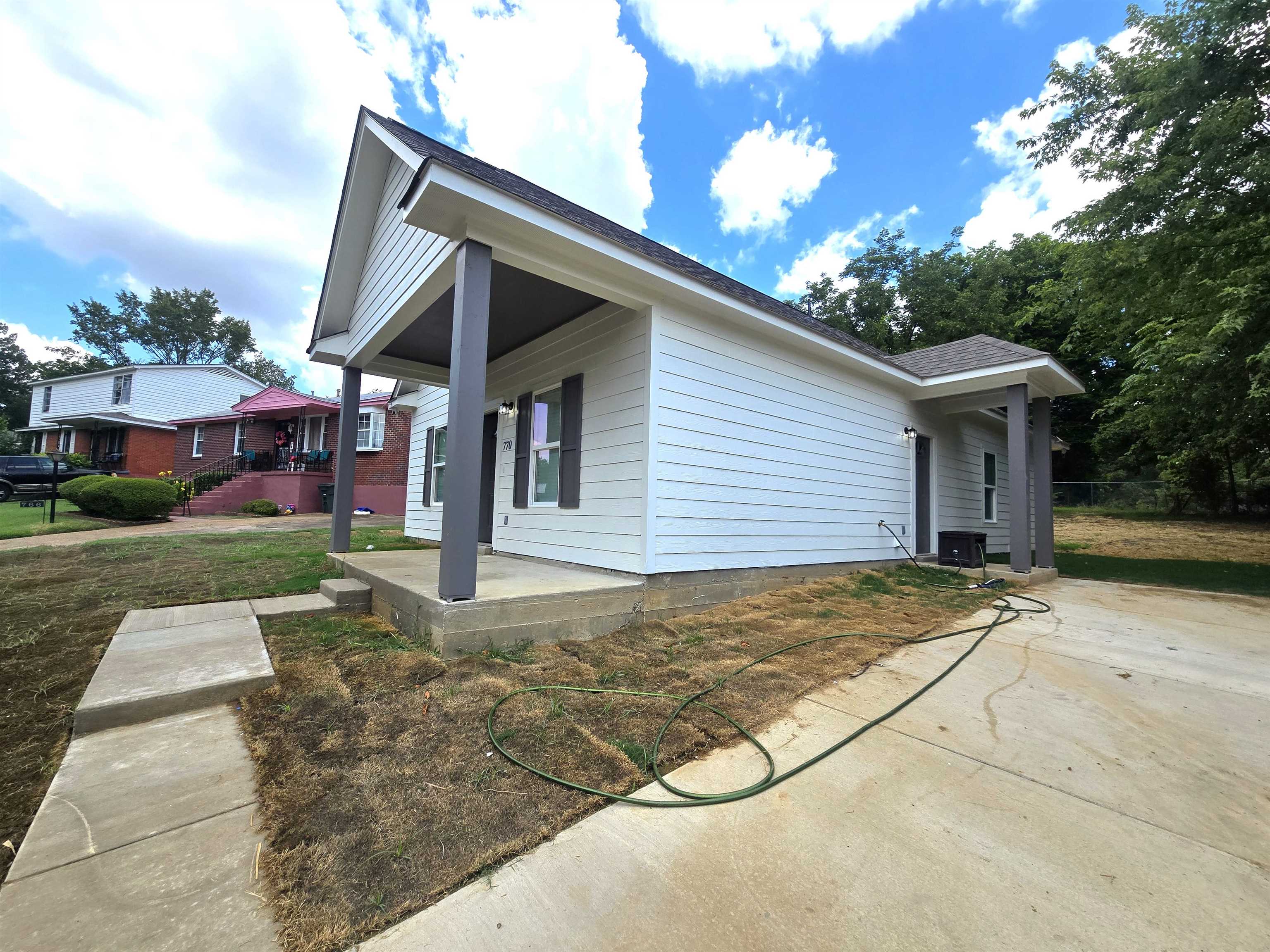 770 Cherokee Avenue Memphis, TN 38106 - Photo 2 of 14 a view of a house with a yard