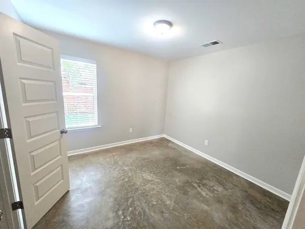 an empty room with a window