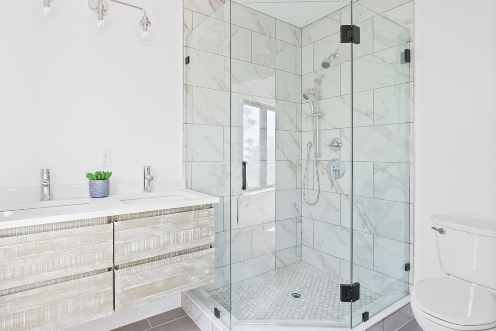 44 Cottage Street, Unit 2 Boston, MA 02128 - Photo 16 of 18 a bathroom with a shower and a mirror