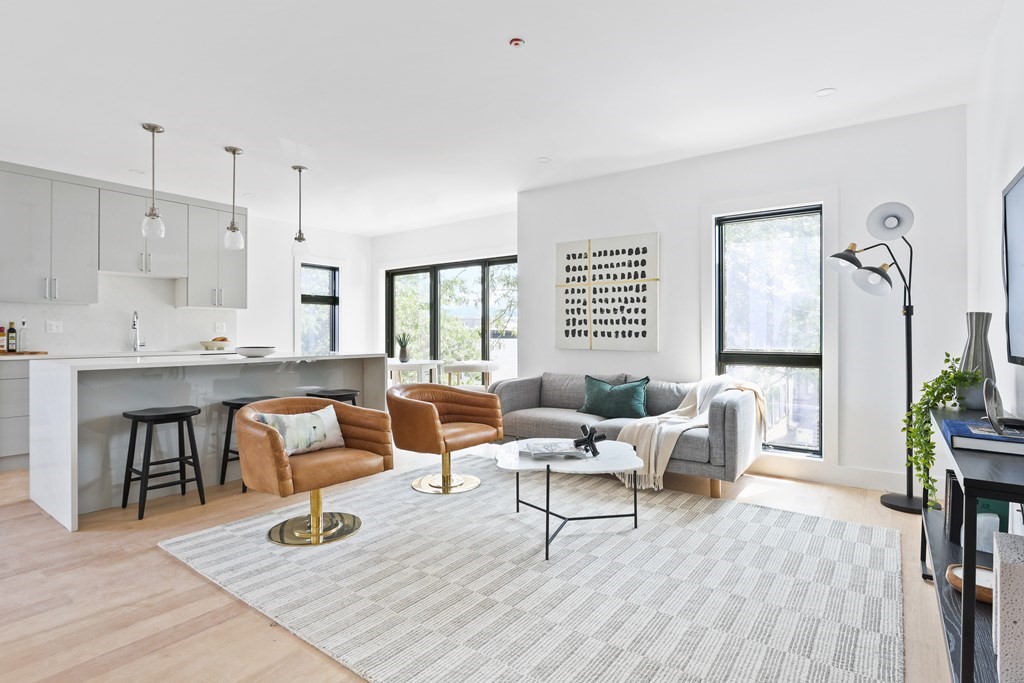 44 Cottage Street, Unit 2 Boston, MA 02128 - Photo 3 of 18 a living room with furniture and wooden floor
