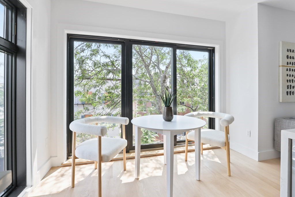 44 Cottage Street, Unit 2 Boston, MA 02128 - Photo 8 of 18 a view of a dining room with furniture window and outside view