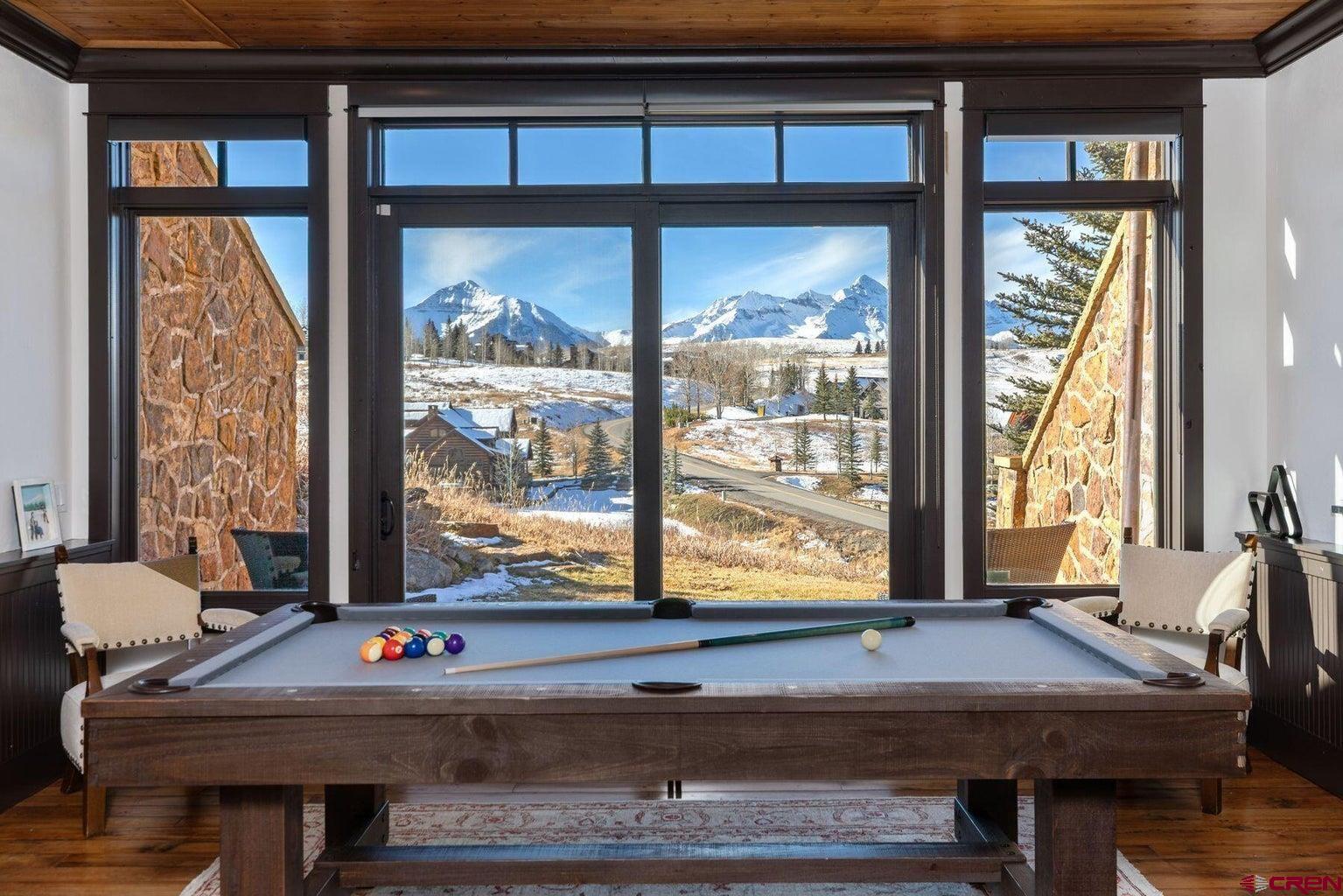 172 Adams Ranch Road Mountain Village, CO 81435 - Photo 18 of 29 a room with furniture pool table and windows