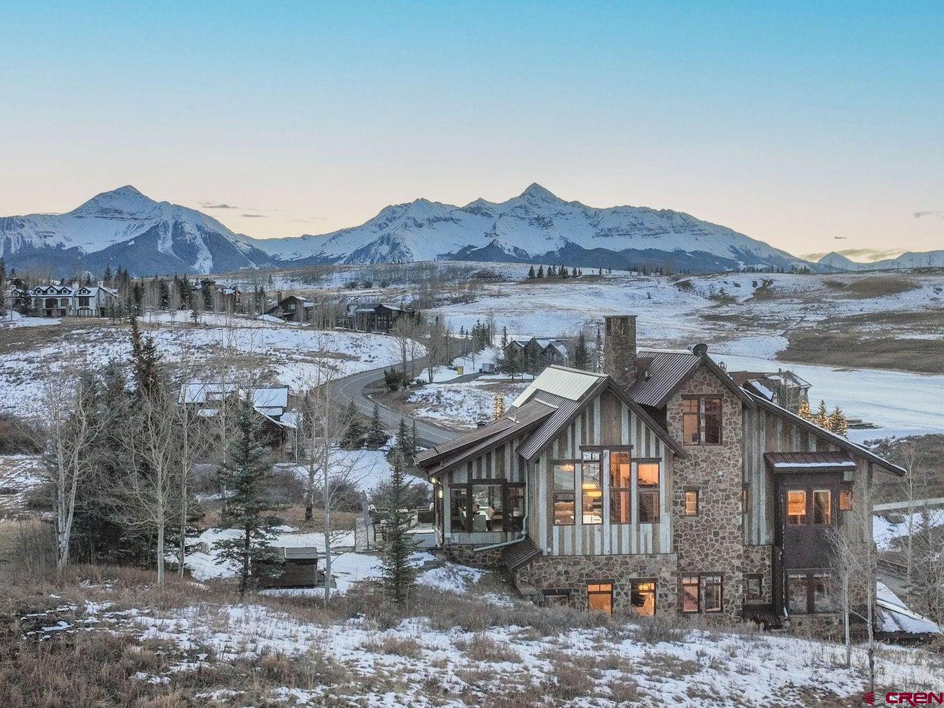 172 Adams Ranch Road Mountain Village, CO 81435 - Photo 29 of 29 a view of a big house with a big yard and mountain view