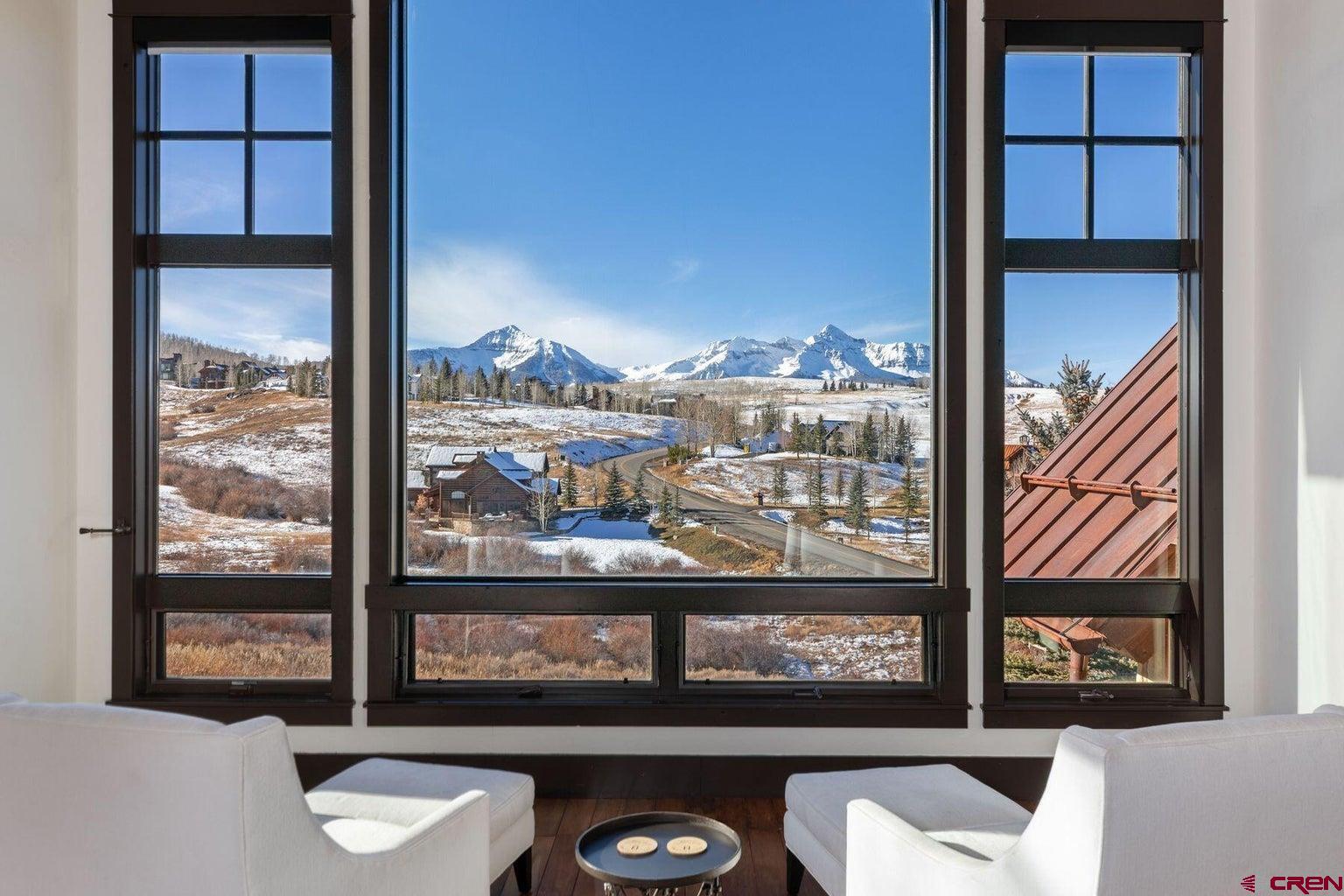 172 Adams Ranch Road Mountain Village, CO 81435 - Photo 5 of 29 a view of a balcony with chair and city view