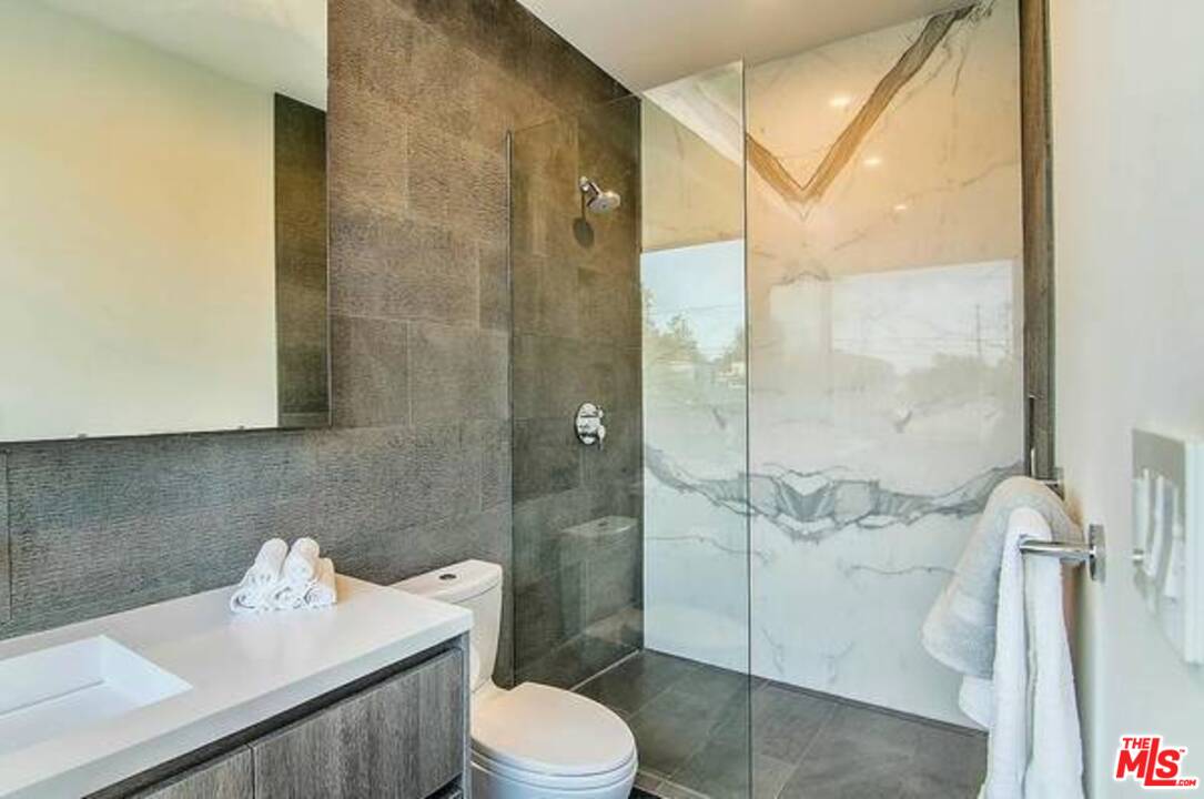 2021 Walnut Avenue Venice, CA 90291 - Photo 14 of 23 a bathroom with a sink toilet and shower