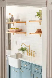 a bathroom with a sink and a window