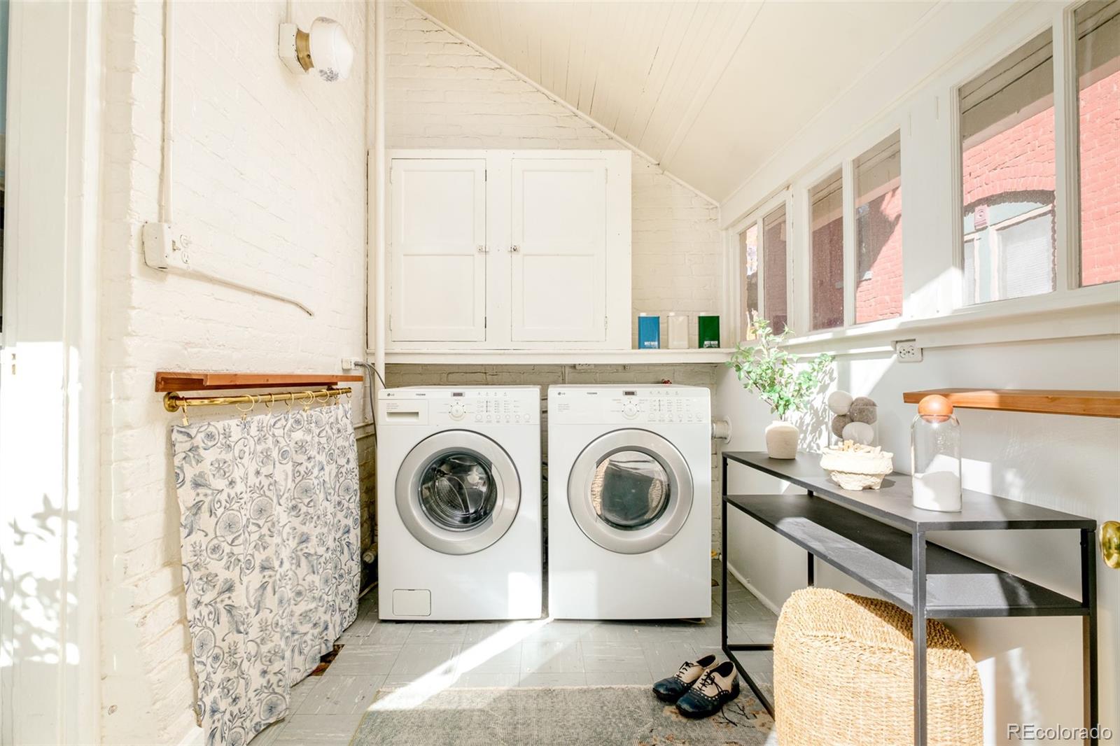 3042 West 24th Avenue Denver, CO 80211 - Photo 15 of 32 a utility room with dryer and washer
