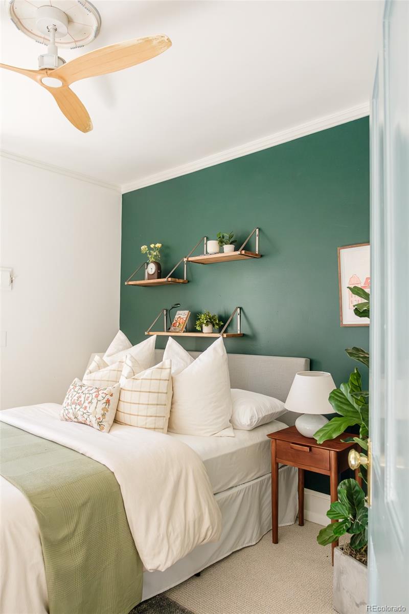 3042 West 24th Avenue Denver, CO 80211 - Photo 26 of 32 a bedroom with a bed and a window