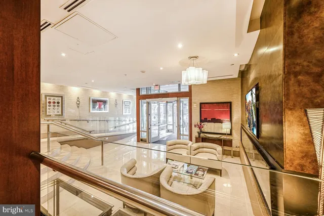 a view of a living room and dining room