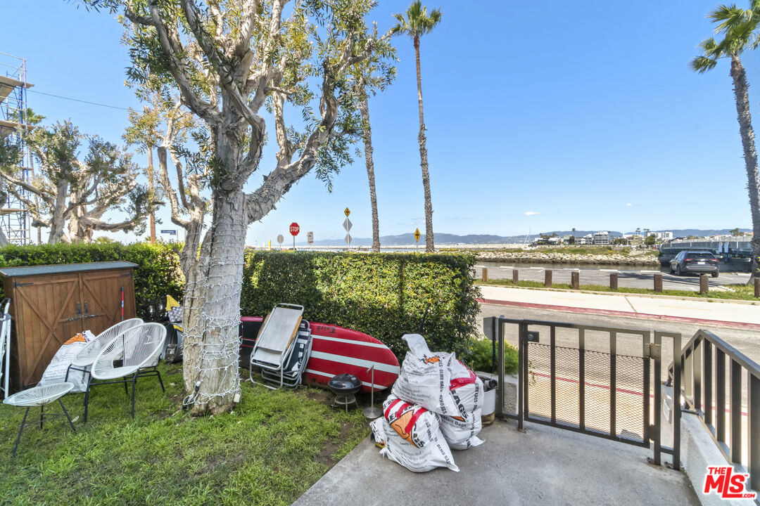 6209 Pacific Avenue, Unit 103 Playa del Rey, CA 90293 - Photo 31 of 40 a view of a chair and tables in the balcony