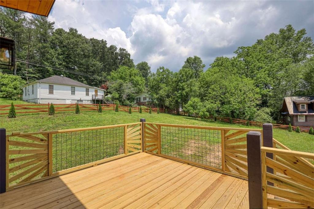 485 Church Street Blue Ridge, GA 30513 - Photo 46 of 85 a view of deck with mountain and trees in the background