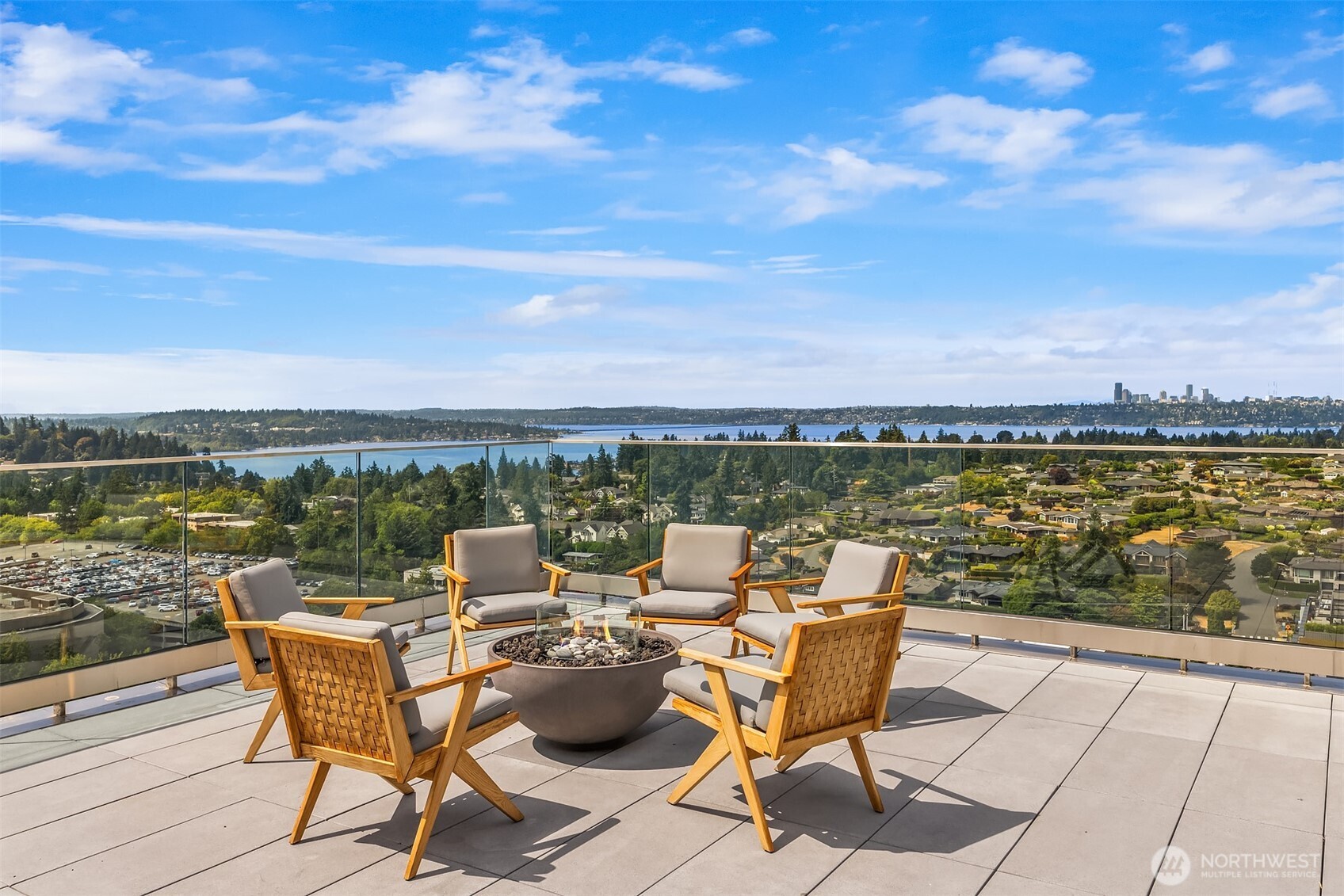 a view of a lake with furniture