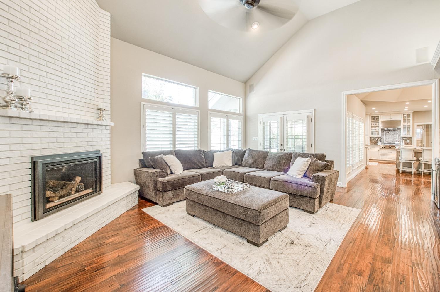 692 East Blue Ridge Road Fresno, CA 93725 - Photo 29 of 68 a living room with furniture and a fireplace