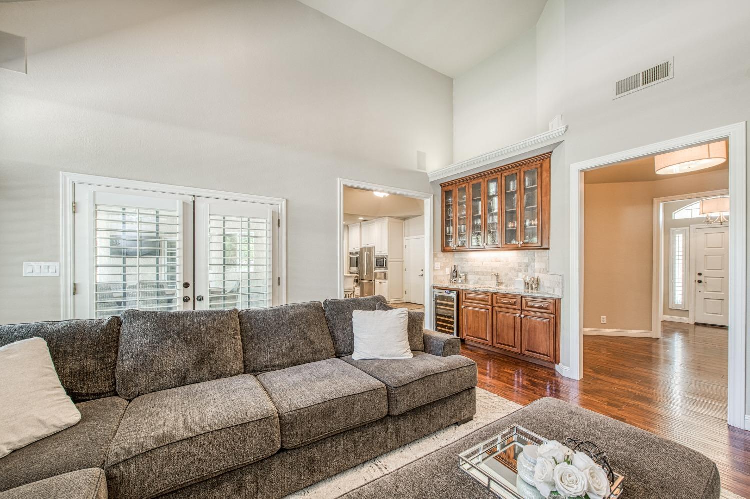 692 East Blue Ridge Road Fresno, CA 93725 - Photo 31 of 68 a living room with furniture and a large window