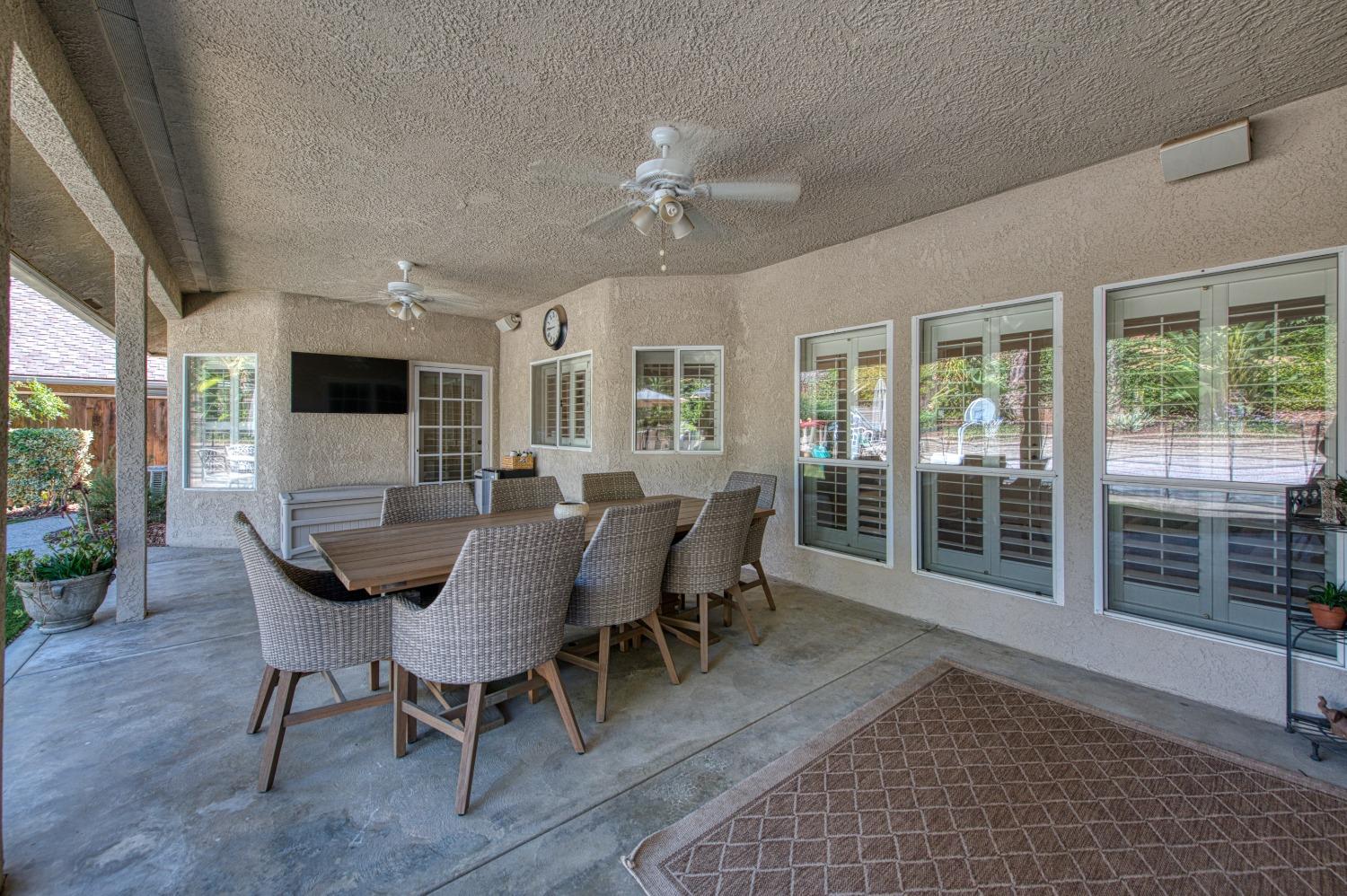 692 East Blue Ridge Road Fresno, CA 93725 - Photo 49 of 68 a view of a dining room with furniture window and wooden floor