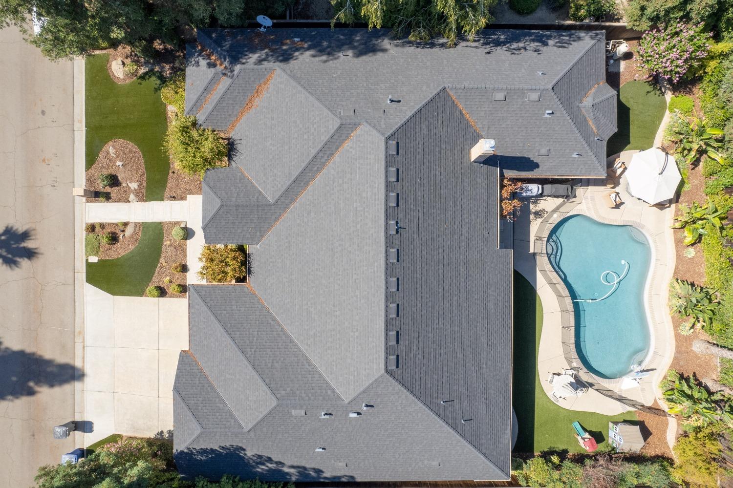 692 East Blue Ridge Road Fresno, CA 93725 - Photo 6 of 68 an aerial view of residential house with outdoor space and parking