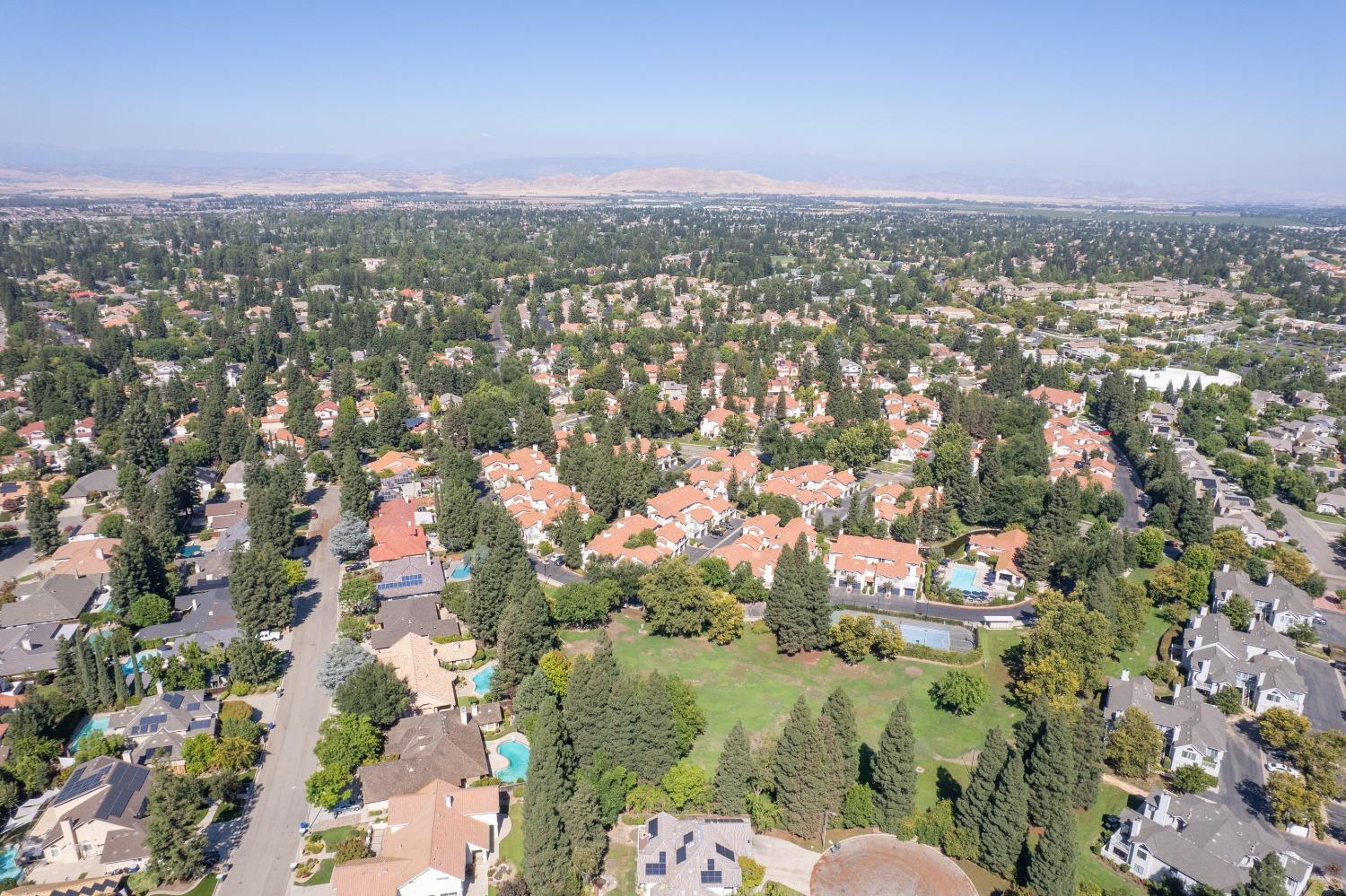 692 East Blue Ridge Road Fresno, CA 93725 - Photo 67 of 68 an aerial view of a residential houses with city view